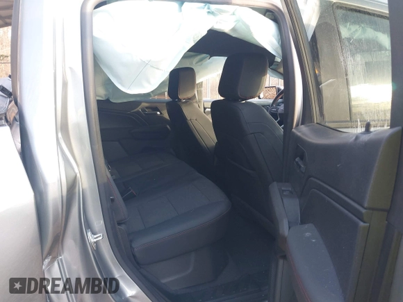 2024 Chevrolet Colorado 4WD Z71 with VIN 1GCPTDEK3R1122785, listed as a IAAI auction lot 41836221 with 3,313 mi miles and . Bid and sale history available at DreamBid. Image 8.