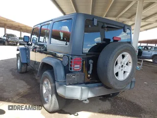 2016 Jeep Wrangler Unlimited Sport with VIN 1C4BJWDG9GL161844, listed as a IAAI auction lot 42074473 with 109,508 mi miles and . Bid and sale history available at DreamBid. Image 3.