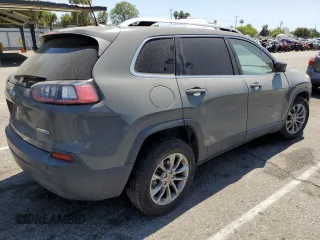 2020 Jeep Cherokee Altitude with VIN 1C4PJLLB4LD615593, listed as a Copart auction lot 58412635 with 95,697 mi miles and Salvage title. Bid and sale history available at DreamBid. Image 3.