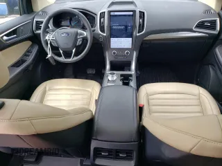 2022 Ford Edge SEL z VIN 2FMPK4J98NBB13788, wystawiony jako Copart lot #54913805 z przebiegiem 25 594 mil mil oraz Szkoda całkowita • Salvage title. Historia ofert i sprzedaży dostępna na DreamBid. Obrazek 8.