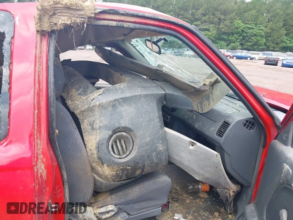 2001 Nissan Frontier SE Desert Runner z VIN 1N6ED26T31C354339, wystawiony jako IAAI lot #42279697 z przebiegiem Nie podano mil oraz . Historia ofert i sprzedaży dostępna na DreamBid. Obrazek 5.