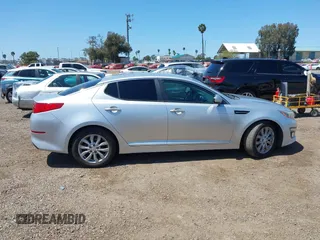 2015 Kia Optima EX with VIN 5XXGN4A73FG436223, listed as a IAAI auction lot 41970418 with 174,002 mi miles. Bid and sale history available at carsss.com. Image 13.