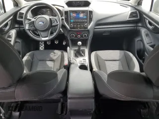 2018 Subaru Impreza with VIN 4S3GTAF65J1751579, listed as a Copart auction lot 61690535 with 77,316 mi miles and Salvage title. Bid and sale history available at DreamBid. Image 8.