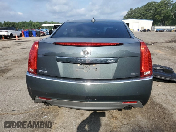 2013 Cadillac CTS Performance z VIN 1G6DK5E3XD0104466, wystawiony jako Copart lot #57479555 z przebiegiem Nie podano mil oraz Szkoda całkowita • Salvage title. Historia ofert i sprzedaży dostępna na DreamBid. Obrazek 6.