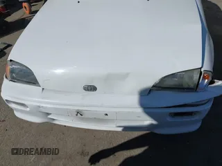 1992 Geo Metro z VIN JG1MR3364NK213871, wystawiony jako IAAI lot #41719350 z przebiegiem 22 589 mil mil oraz . Historia ofert i sprzedaży dostępna na DreamBid. Obrazek 6.
