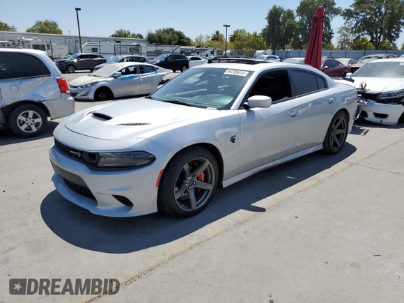 2019 Dodge Charger SRT Hellcat with VIN 2C3CDXL96KH588025, listed as a Copart auction lot 64705614 with 49,659 mi miles and Salvage Title. Bid and sale history available at DreamBid. Image 1.