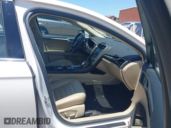 2014 Ford Fusion SE Hybrid with VIN 3FA6P0LUXER233658, listed as a IAAI auction lot 42311588 with 106,282 mi miles and . Bid and sale history available at DreamBid. Image 5.