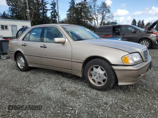 2000 Mercedes-Benz C 230 Kompressor with VIN WDBHA24GXYA855697, listed as a Copart auction lot 52633465 with 191,235 mi miles and Salvage Title. Bid and sale history available at carsss.com. Image 4.