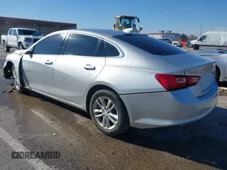 2018 Chevrolet Malibu LT z VIN 1G1ZD5ST1JF261841, wystawiony jako IAAI lot #41887177 z przebiegiem 128 213 mil mil oraz . Historia ofert i sprzedaży dostępna na DreamBid. Obrazek 3.