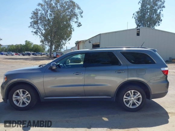 2012 Dodge Durango Crew with VIN 1C4RDHDG2CC317136, listed as a IAAI auction lot 41993837 with 131,048 mi miles and . Bid and sale history available at DreamBid. Image 14.