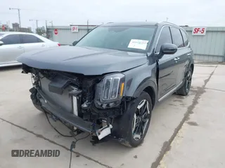 2024 Kia Telluride S with VIN 5XYP64GC1RG526939, listed as a IAAI auction lot 41619752 with 6,042 mi miles and . Bid and sale history available at carsss.com. Image 2.