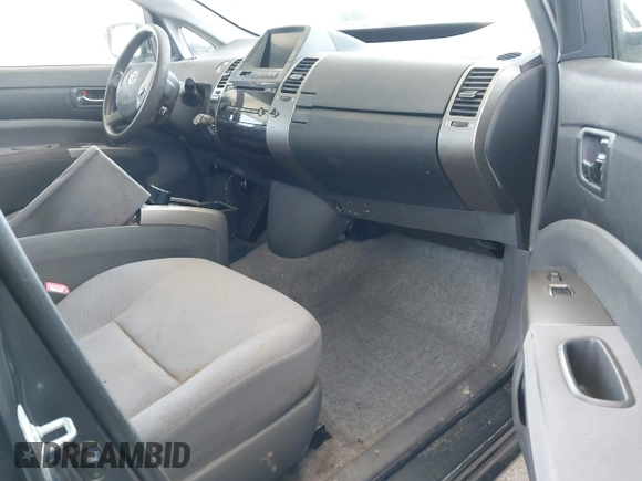 2007 Toyota Prius z VIN JTDKB20UX73281542, wystawiony jako IAAI lot #42449989 z przebiegiem 164 111 mil mil oraz . Historia ofert i sprzedaży dostępna na DreamBid. Obrazek 5.