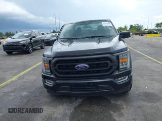 2023 Ford F-150 XL with VIN 1FTEW1C52PFA90311, listed as a IAAI auction lot 42192960 with Not Provided miles and . Bid and sale history available at DreamBid. Image 12.