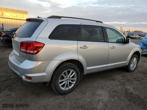 2014 Dodge Journey SXT with VIN 3C4PDCBG7ET107717, listed as a Copart auction lot 49899385 with 131,371 mi miles and Salvage Title. Bid and sale history available at carsss.com. Image 3.