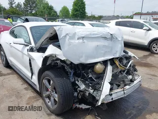 2016 Ford Mustang V6 z VIN 1FA6P8AMXG5292619, wystawiony jako IAAI lot #42088066 z przebiegiem 101 905 mil mil oraz . Historia ofert i sprzedaży dostępna na DreamBid. Obrazek 1.