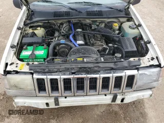 1995 Jeep Grand Cherokee Laredo z VIN 1J4GZ58S2SC578183, wystawiony jako Copart lot #61665955 z przebiegiem 341 135 mil mil oraz Szkoda całkowita • Salvage title. Historia ofert i sprzedaży dostępna na DreamBid. Obrazek 11.