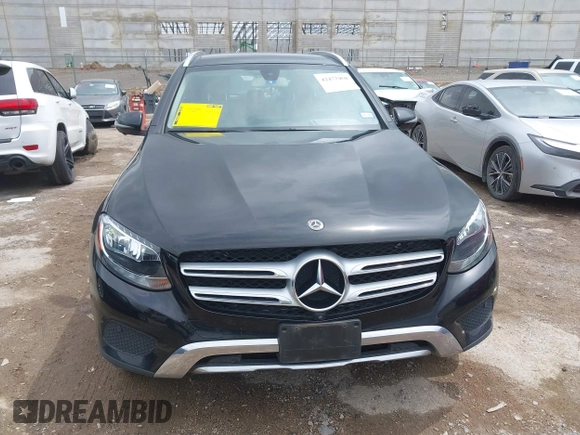 2019 Mercedes-Benz GLC 300 with VIN WDC0G4JB6KV185786, listed as a IAAI auction lot 42472450 with 86,561 mi miles and . Bid and sale history available at DreamBid. Image 12.