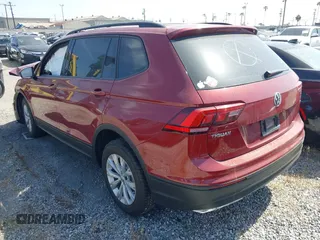 2018 Volkswagen Tiguan S with VIN 3VV1B7AX3JM128705, listed as a IAAI auction lot 42110808 with 60,589 mi miles and . Bid and sale history available at DreamBid. Image 3.