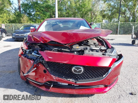 2018 Mazda 6 Grand Touring with VIN JM1GL1TY1J1302146, listed as a IAAI auction lot 41788881 with 55,852 mi miles and . Bid and sale history available at DreamBid. Image 13.