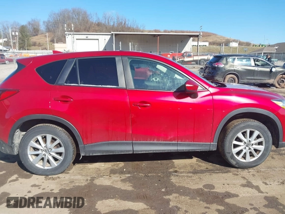 2016 Mazda CX-5 Touring with VIN JM3KE4CY4G0860035, listed as a IAAI auction lot 41678299 with 72,101 mi miles. Bid and sale history available at carsss.com. Image 13.