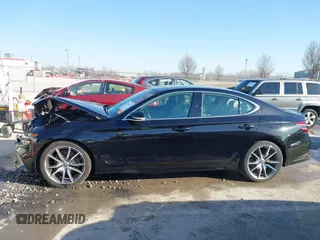 2022 Genesis G70 2.0T z VIN KMTG34TA0NU098580, wystawiony jako IAAI lot #41763511 z przebiegiem 87 816 mil mil oraz . Historia ofert i sprzedaży dostępna na DreamBid. Obrazek 14.