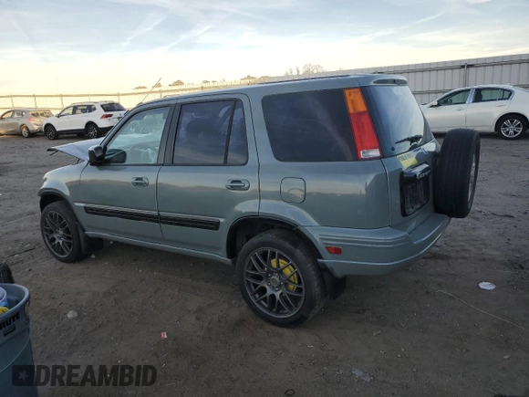2000 Honda CR-V EX with VIN JHLRD1863YC006639, listed as a Copart auction lot 80442254 with 200,218 mi miles and Salvage Title. Bid and sale history available at carsss.com. Image 2.