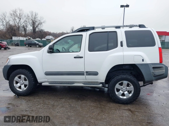 2012 Nissan Xterra X with VIN 5N1AN0NU9CC521430, listed as a IAAI auction lot 41076321 with 140,351 mi miles and . Bid and sale history available at DreamBid. Image 14.