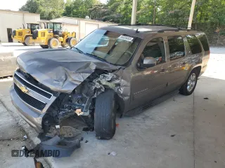 2014 Chevrolet Suburban LT with VIN 1GNSCJE00ER200580, listed as a Copart auction lot 60539465 with 210,988 mi miles and Salvage title. Bid and sale history available at DreamBid. Image 1.