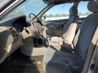 1998 Toyota Corolla VE with VIN 1NXBR12E3WZ093073, listed as a Copart auction lot 58270705 with 303,875 mi miles and Salvage title. Bid and sale history available at DreamBid. Image 7.