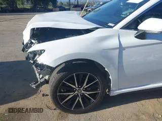 2023 Toyota Camry SE with VIN 4T1T11AK8PU836864, listed as a IAAI auction lot 41933124 with 50,263 mi miles and . Bid and sale history available at DreamBid. Image 6.