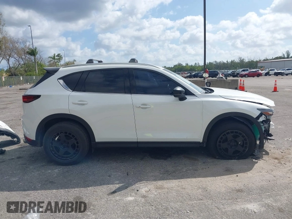2021 Mazda CX-5 Signature with VIN JM3KFBEY0M0436264, listed as a IAAI auction lot 41568892 with 36,833 mi miles. Bid and sale history available at carsss.com. Image 13.