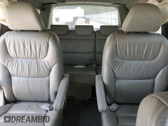 2007 Honda Odyssey EX-L with VIN 5FNRL38657B059033, listed as a Copart auction lot 54005495 with 212,674 mi miles and Salvage Title. Bid and sale history available at DreamBid. Image 10.