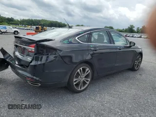 2017 Ford Fusion Titanium z VIN 3FA6P0K92HR192881, wystawiony jako Copart lot #61190515 z przebiegiem 109 834 mil mil oraz Szkoda całkowita • Salvage title. Historia ofert i sprzedaży dostępna na DreamBid. Obrazek 3.