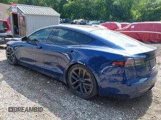 2022 Tesla Model S with VIN 5YJSA1E55NF486443, listed as a IAAI auction lot 42720110 with Not provided miles and . Bid and sale history available at DreamBid. Image 3.