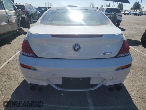 2010 BMW M6 z VIN WBSEH9C52ACY25220, wystawiony jako Copart lot #80767324 z przebiegiem Nie podano mil oraz Szkoda całkowita • Salvage title. Historia ofert i sprzedaży dostępna na DreamBid. Obrazek 6.