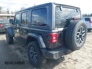 2025 Jeep Wrangler Sahara with VIN 1C4PJXENXSW527925, listed as a IAAI auction lot 41818650 with 5,478 mi miles and . Bid and sale history available at DreamBid. Image 3.