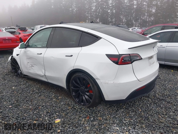 2023 Tesla Model Y Performance z VIN 7SAYGDEF2PF917295, wystawiony jako IAAI lot #41260852 z przebiegiem 23 295 mil mil oraz . Historia ofert i sprzedaży dostępna na DreamBid. Obrazek 3.