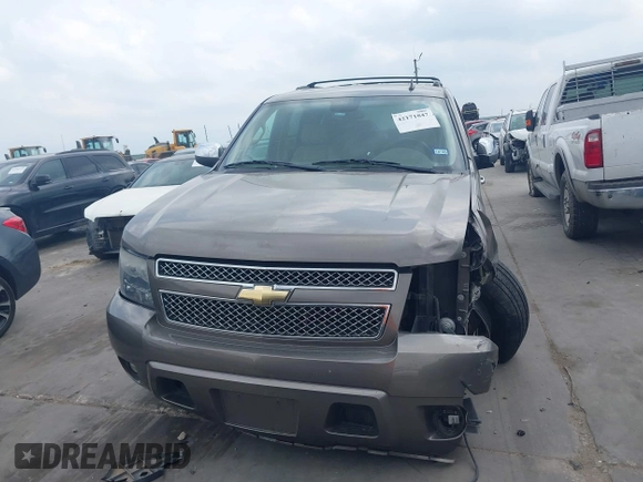 2011 Chevrolet Tahoe LTZ z VIN 1GNSCCE08BR394055, wystawiony jako IAAI lot #42171847 z przebiegiem 112 163 mil mil oraz . Historia ofert i sprzedaży dostępna na DreamBid. Obrazek 12.