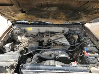 1999 Toyota Tacoma with VIN 4TAWN72NXXZ563507, listed as a Copart auction lot 49888575 with 387,818 mi miles and Salvage title. Bid and sale history available at DreamBid. Image 11.