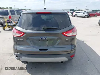 2015 Ford Escape SE with VIN 1FMCU0G7XFUA89965, listed as a IAAI auction lot 42072553 with 129,877 mi miles. Bid and sale history available at carsss.com. Image 16.