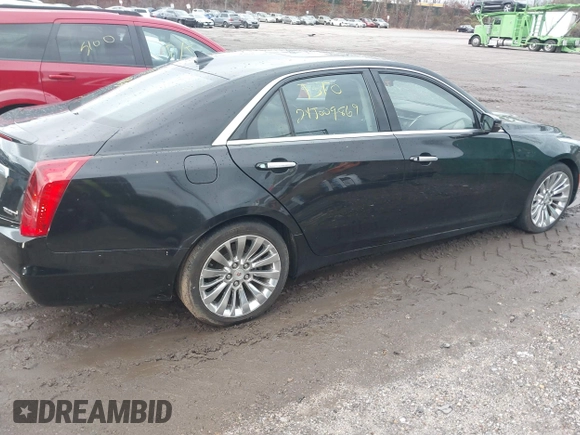 2014 Cadillac CTS Luxury AWD with VIN 1G6AX5SX9E0195923, listed as a IAAI auction lot 40946334 with Not Provided miles and . Bid and sale history available at carsss.com. Image 4.