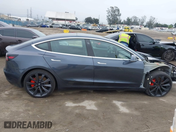 2020 Tesla Model 3 Performance z VIN 5YJ3E1EC3LF802068, wystawiony jako IAAI lot #41886024 z przebiegiem 50 271 mil mil oraz . Historia ofert i sprzedaży dostępna na DreamBid. Obrazek 14.