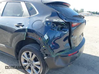 2023 Mazda CX-30 S Select with VIN 3MVDMBBM4PM558831, listed as a IAAI auction lot 42432750 with 12,468 mi miles and . Bid and sale history available at DreamBid. Image 6.