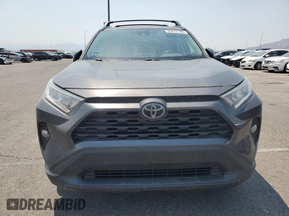 2020 Toyota RAV4 XLE with VIN 2T3W1RFV8LW070246, listed as a Copart auction lot 65072185 with 61,339 mi miles and Salvage title. Bid and sale history available at DreamBid. Image 5.