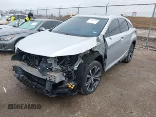 2016 Lexus RX 450h with VIN 2T2BGMCA6GC002928, listed as a IAAI auction lot 41566359 with 98,437 mi miles and . Bid and sale history available at DreamBid. Image 2.