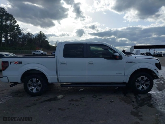 2011 Ford F-150 XLT with VIN 1FTFW1CTXBKE06928, listed as a IAAI auction lot 41718059 with 99,877 mi miles. Bid and sale history available at carsss.com. Image 14.