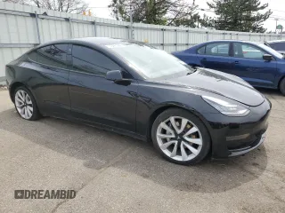 2021 Tesla Model 3 Standard Range Plus with VIN 5YJ3E1EA2MF850760, listed as a Copart auction lot 53487885 with 71,065 mi miles and Clean Title. Bid and sale history available at DreamBid. Image 4.