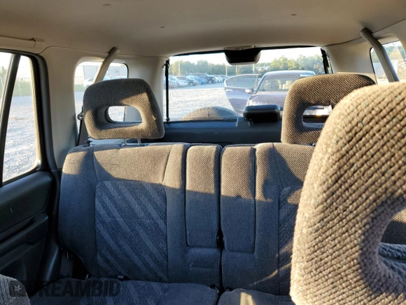 2000 Honda CR-V LX with VIN JHLRD1848YC038520, listed as a Copart auction lot 74137634 with 104,332 mi miles and Salvage Title. Bid and sale history available at carsss.com. Image 10.