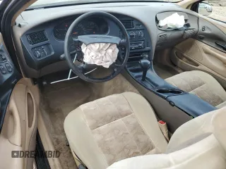 1997 Ford Thunderbird LX z VIN 1FALP62W0VH157636, wystawiony jako Copart lot #57436535 z przebiegiem 120 433 mil mil oraz Szkoda całkowita • Salvage title. Historia ofert i sprzedaży dostępna na DreamBid. Obrazek 8.