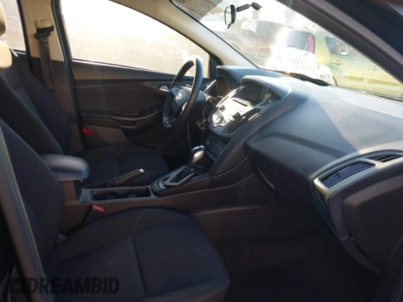 2015 Ford Focus SE with VIN 1FADP3F29FL350473, listed as a IAAI auction lot 41032182 with 102,898 mi miles. Bid and sale history available at carsss.com. Image 5.